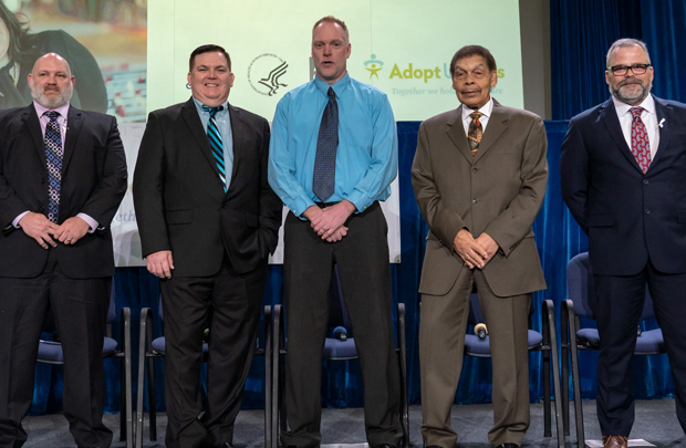 Adoptive fathers (left to right) Travis Thompson, Christopher Keen, Scott Arnson, Robert Edwards, and Mike Allred.