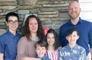 Wendy and Joey Garren pose with their four adopted children.