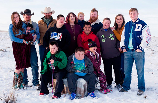 Pinkerton family standing outside in snow